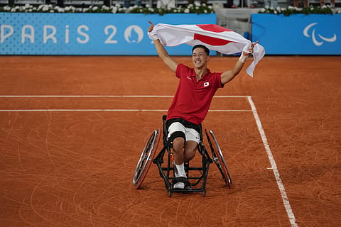 Japan's Tokito Oda celebrates after winning the men's singles gold medal match of wheelchair tennis at the 2024 Paralympics, Saturday, Sept. 7, 2024, in Paris, France. 
